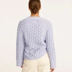 Cotton-blend bouclé cable-knit sweater