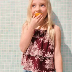 Girls' tiered smocked top in broken-in jersey