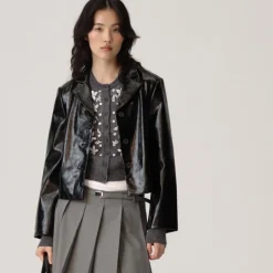 Loose-knit cardigan with floral embellishments