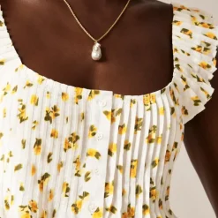 Pintuck peplum top in budding rose print