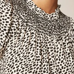 Smocked high-neck top in spot-print crepe de chine