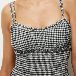 Smocked mini dress in gingham