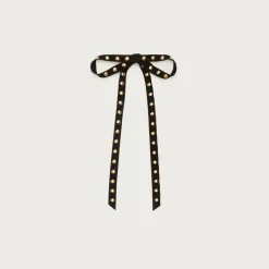 Studded leather hair bow
