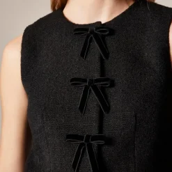 Tweed crewneck vest with velvet bows